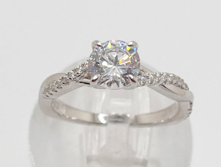 Anillo de plata 925 con circonita corte redondo con infinito