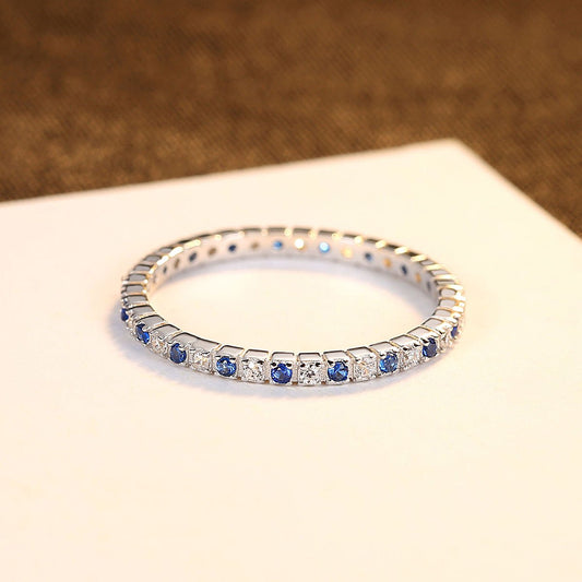 Anillo eternidad, captura la esencia del amor, con circonitas blancas y azules - Aurora Boré