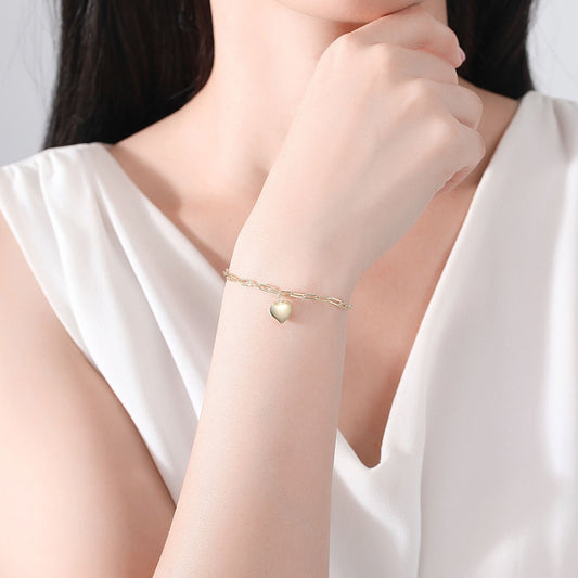 Pulsera de eslabones cubanos con corazón en Plata 925 con baño de Oro - Aurora Boré