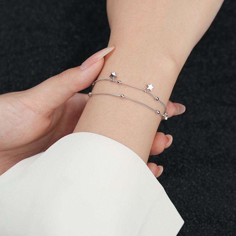 Pulsera de cadena doble con dije de estrella - Aurora Boré