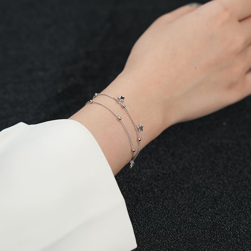 Pulsera de cadena doble con dije de estrella - Aurora Boré