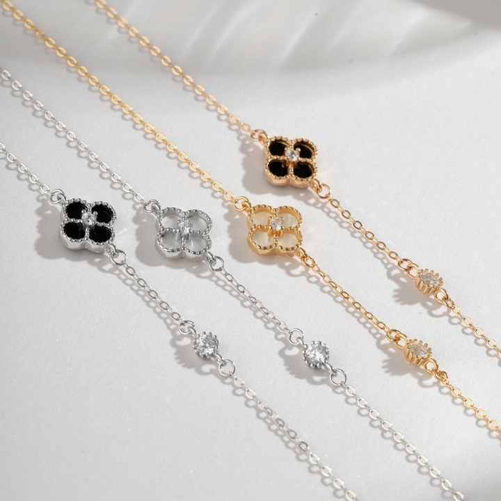 Pulsera en forma de trébol blanco de cuatro hojas hecha de plata 925 Gold Rose - Aurora Boré