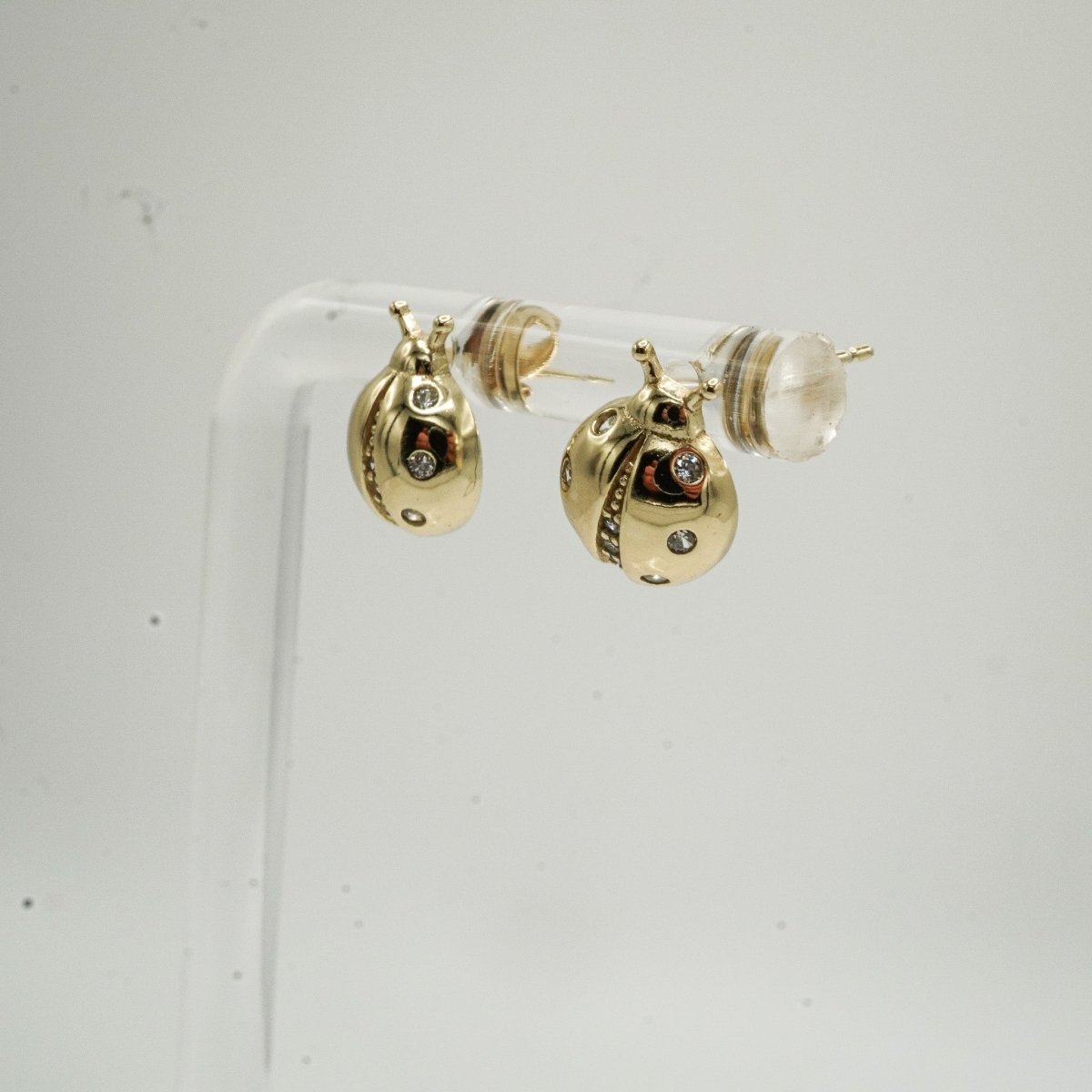 Aretes de tortolita en plata 925 con baño de oro