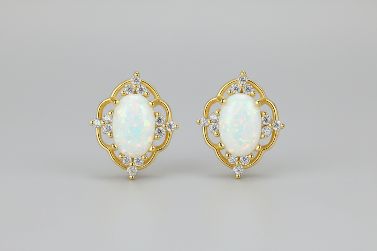 Aretes en plata 925 con baño de Oro 18K y Opalo