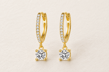 Aretes Huggies tipo Argolla de plata 925 con circonias cúbicas