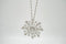 Cadena con colgante de copo de nieve en plata 925 y zirconias brillantes.
